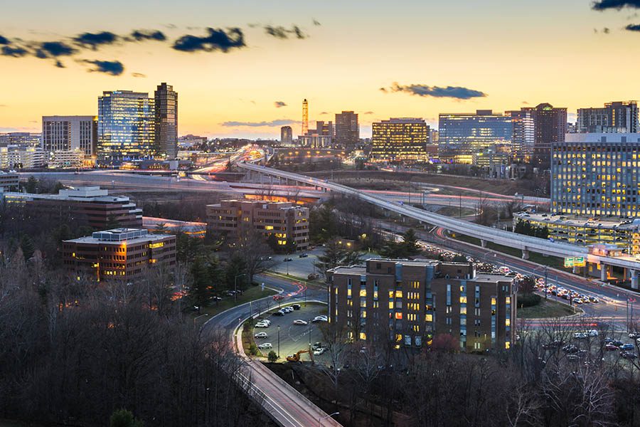 Upper Marlboro, MD - Aerial View of Tysons Corner During Sunset Displaying Many Buildings and Highways
